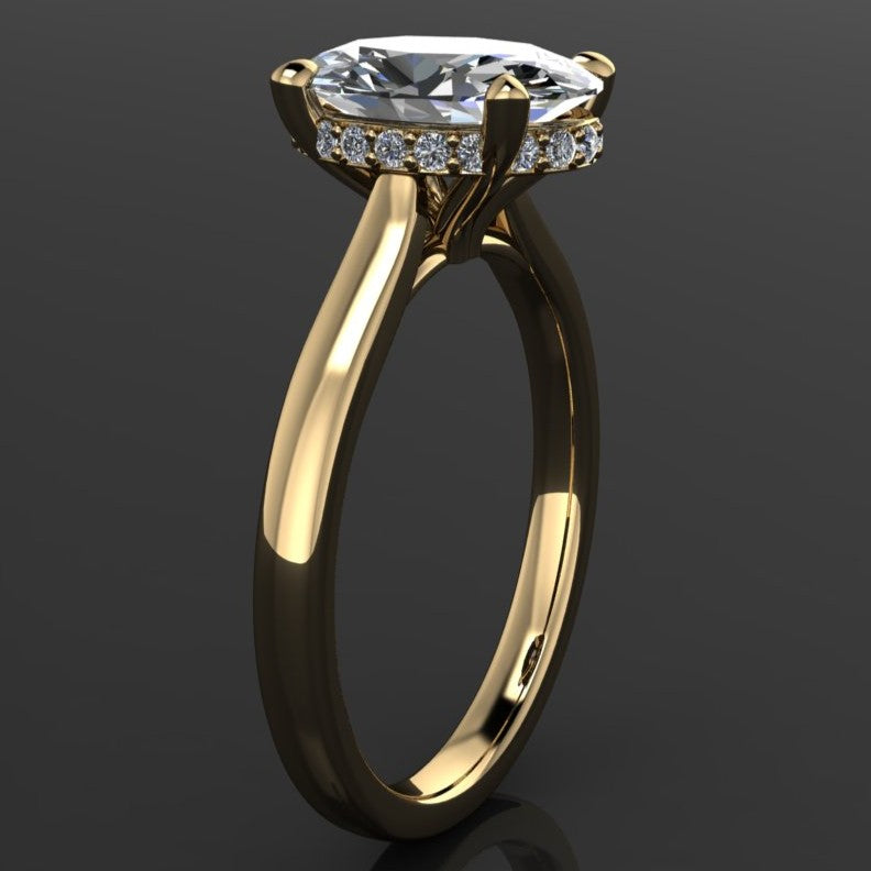 2.5 carat oval moissanite ring in a cathedral setting with a diamond side halo - additional side view