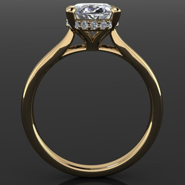 2.5 carat oval moissanite ring in a cathedral setting with a diamond side halo - profile view