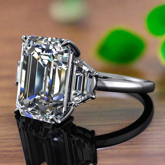 demi ring - 4.3 carat emerald cut and trapezoid engagement ring, side halo - laying down