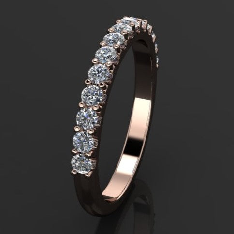 diamond wedding band with half a carat of diamonds set in 14k gold or platinum - side view