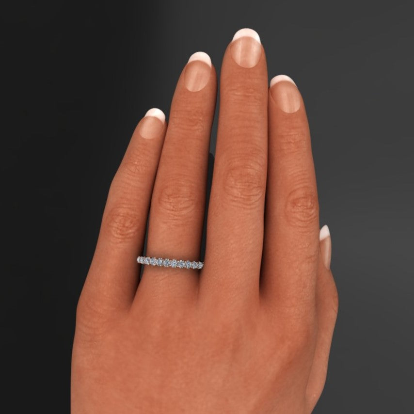 diamond wedding band with half a carat of diamonds set in 14k gold or platinum - hand model view with the band