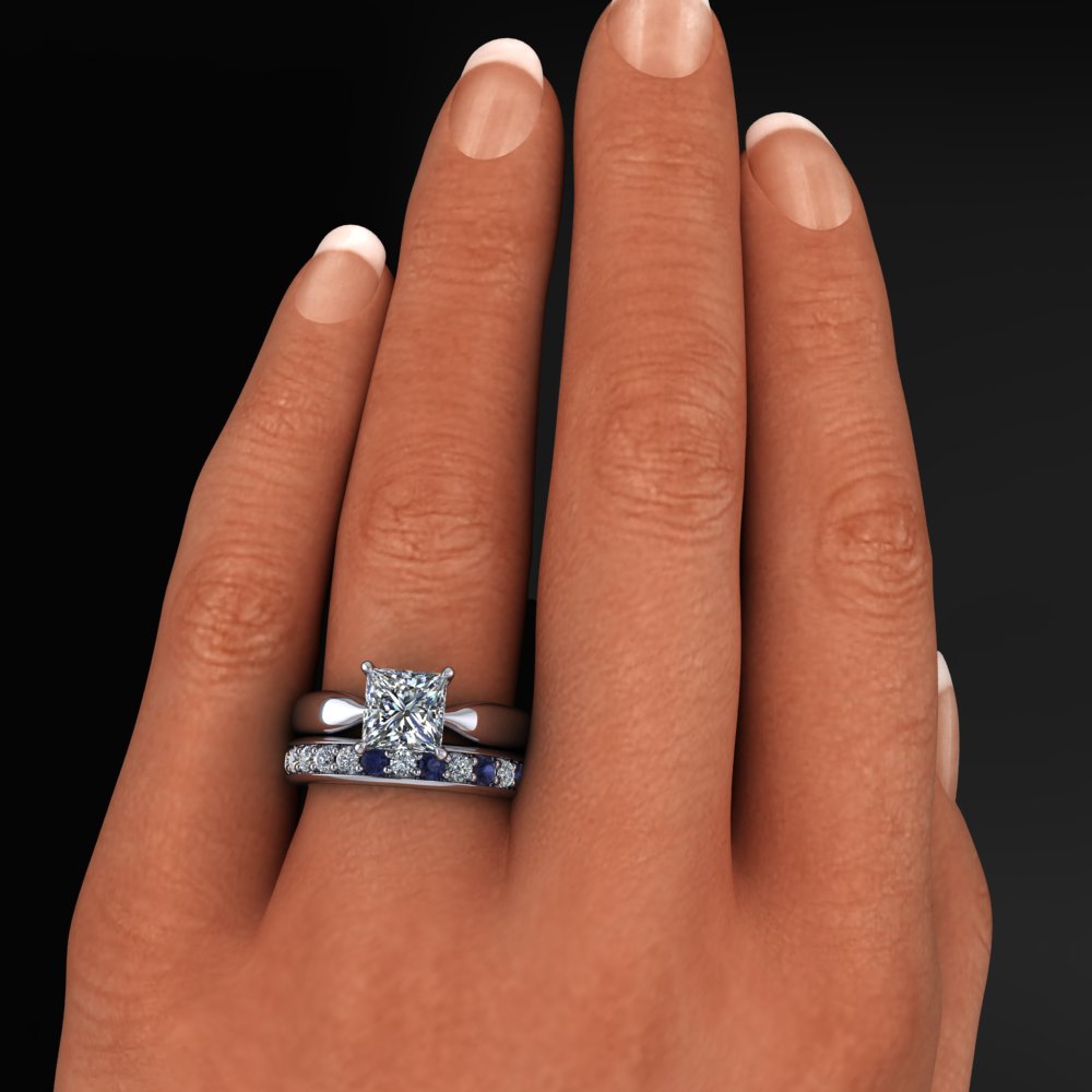 princess cut engagement ring with sapphire band - model shot