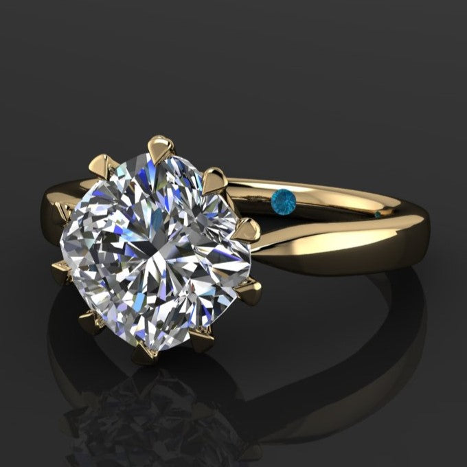 The Lady Danbury ring featuring a 2.5 carat old mine cut cushion moissanite center. A solitaire ring with 10 prongs, horizontal view