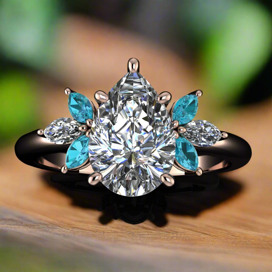 blossom ring - pear shaped engagement rings with petite marquise gemstones - top view