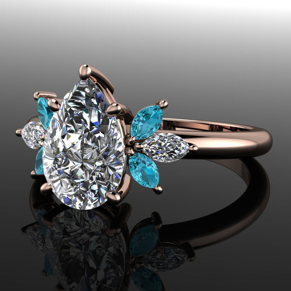 blossom ring - pear shaped engagement rings with petite marquise gemstones - laying flat