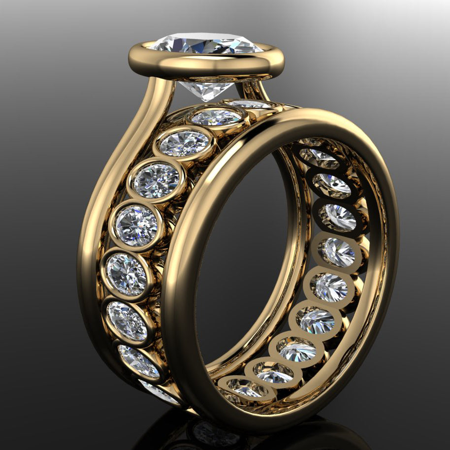 2 carat oval engagement ring with matching oval eternity band, and one gold band - side view