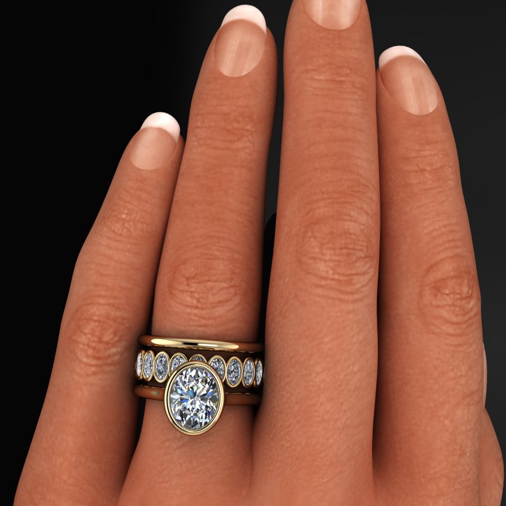 2 carat oval engagement ring with matching oval eternity band, and one gold band - model shot 3