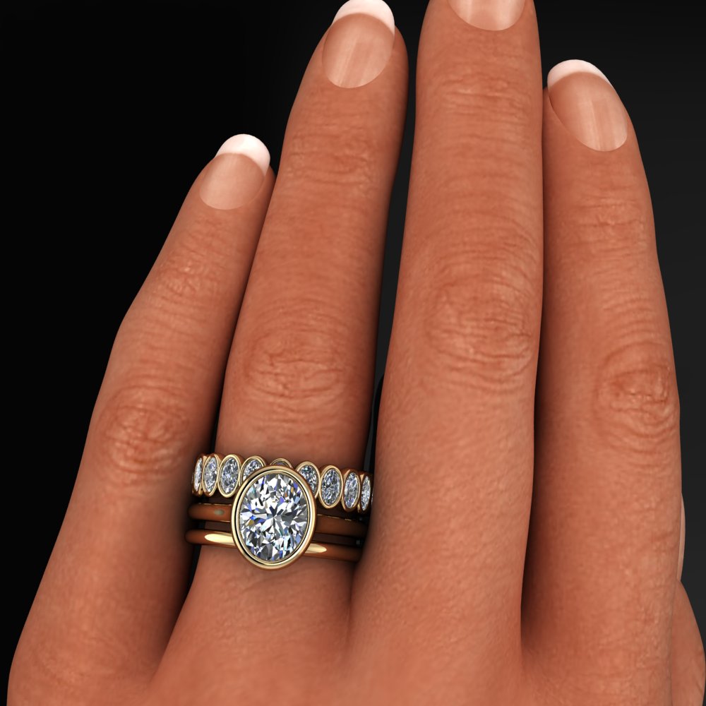 2 carat oval engagement ring with matching oval eternity band, and one gold band - model shot 2