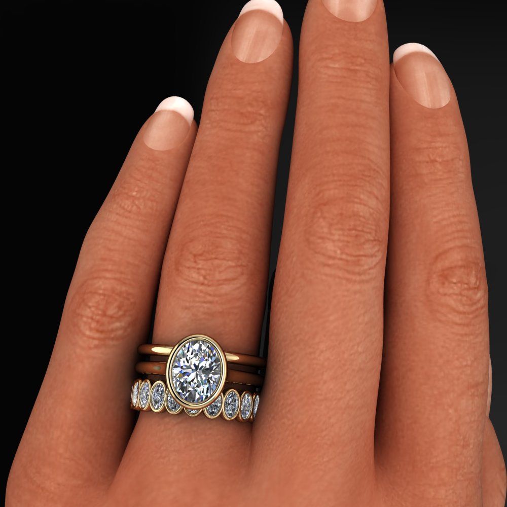 2 carat oval engagement ring with matching oval eternity band, and one gold band - model shot 1