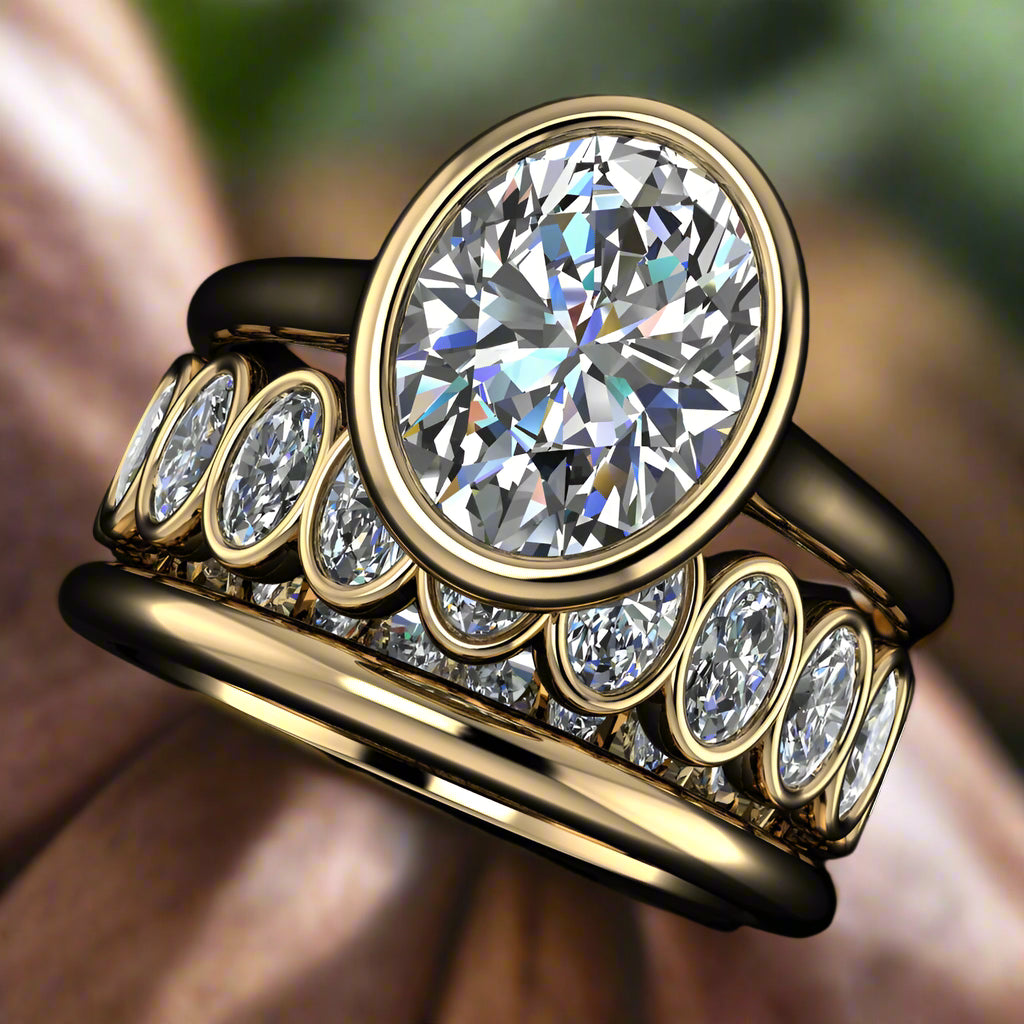 2 carat oval engagement ring with matching oval eternity band, and one gold band - top angle view